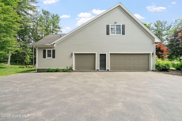 428 Ridgehill Rd, Guilderland, NY 12303 - view of side of property featuring a garage and asphalt driveway