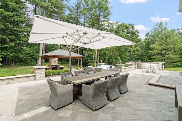 428 Ridgehill Rd, Guilderland, NY 12303 - view of patio with outdoor dining area, a gazebo, and view of scattered trees