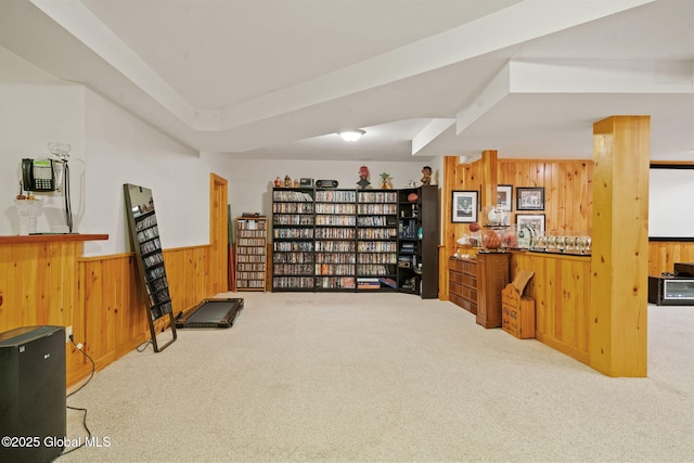 428 Ridgehill Rd, Guilderland, NY 12303 - living area with wood walls, carpet, and wainscoting