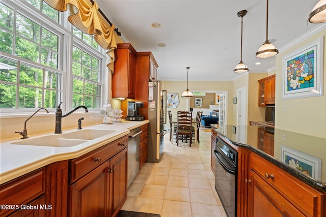 428 Ridgehill Rd, Guilderland, NY 12303 - kitchen featuring appliances with stainless steel finishes, crown molding, light tile patterned floors, decorative light fixtures, and decorative backsplash