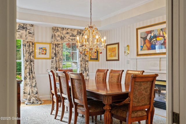 428 Ridgehill Rd, Guilderland, NY 12303 - dining space with wallpapered walls, a chandelier, ornamental molding, and wood finished floors