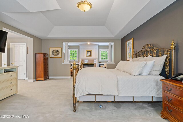 428 Ridgehill Rd, Guilderland, NY 12303 - bedroom featuring a raised ceiling and light colored carpet
