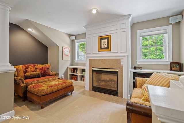 428 Ridgehill Rd, Guilderland, NY 12303 - sitting room featuring a glass covered fireplace and decorative columns