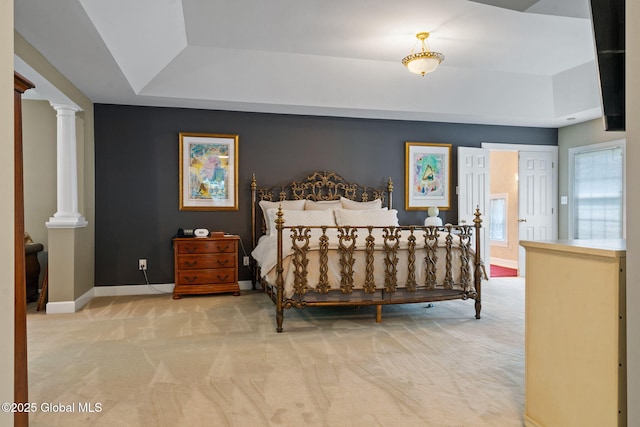 428 Ridgehill Rd, Guilderland, NY 12303 - bedroom with carpet, decorative columns, and a tray ceiling