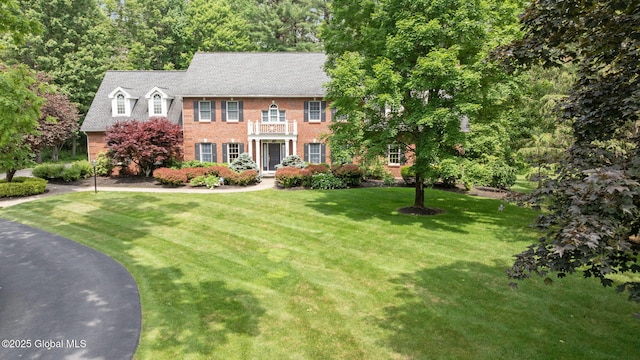 428 Ridgehill Rd, Guilderland, NY 12303 - georgian-style home with brick siding and a front yard