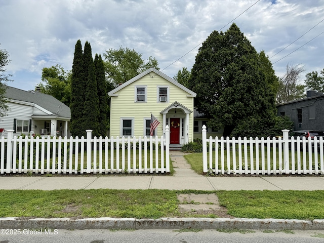 252 Main St, Hudson Falls, NY 12839 - view of front facade featuring a fenced front yard