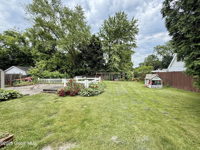 252 Main St, Hudson Falls, NY 12839 - fenced backyard with a playground and a shed