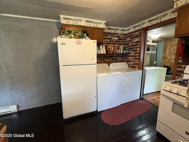 252 Main St, Hudson Falls, NY 12839 - kitchen featuring white appliances, independent washer and dryer, light countertops, brick wall, and baseboard heating