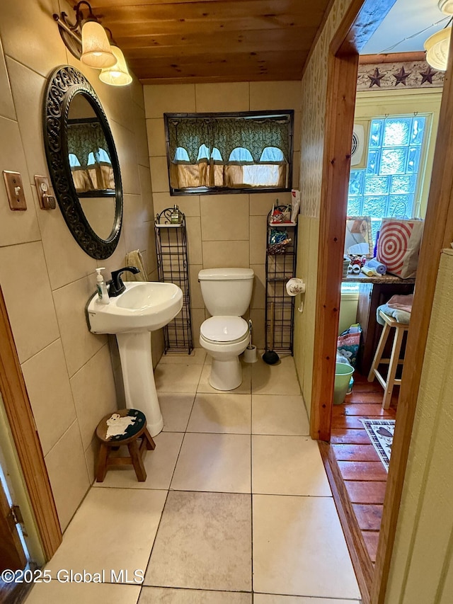 252 Main St, Hudson Falls, NY 12839 - half bath with wooden ceiling and tile patterned flooring