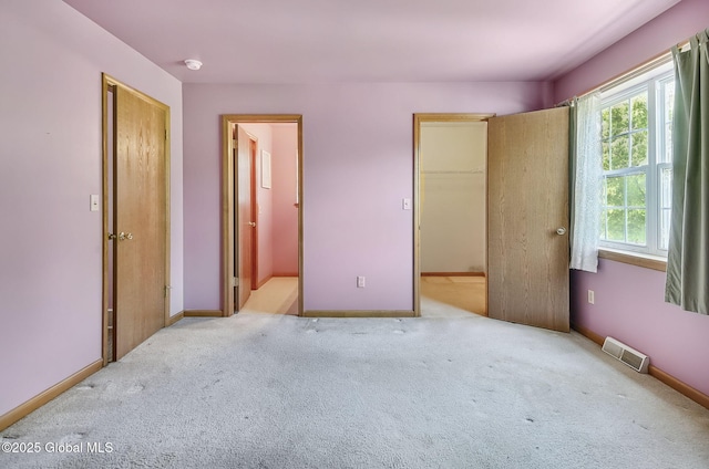 20 Lafayette Park, Green Island, NY 12183 - unfurnished bedroom with carpet and a walk in closet