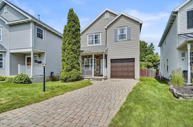 20 Lafayette Park, Green Island, NY 12183 - traditional-style home featuring a porch, decorative driveway, and an attached garage