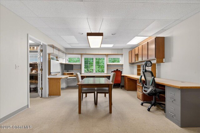 460 Grand Ave, Saratoga Springs, NY 12866 - office area with a drop ceiling, built in study area, and light floors