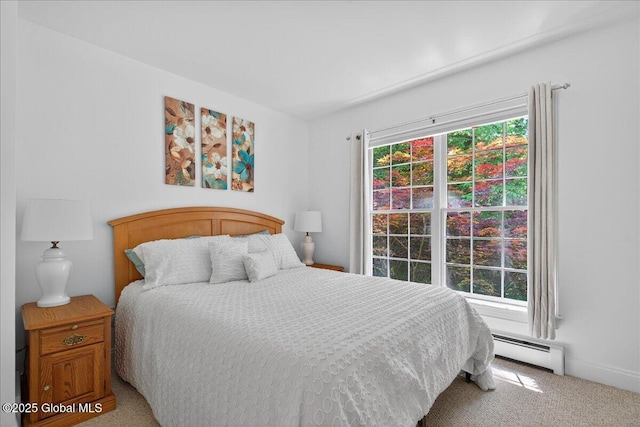 460 Grand Ave, Saratoga Springs, NY 12866 - carpeted bedroom featuring a baseboard heating unit