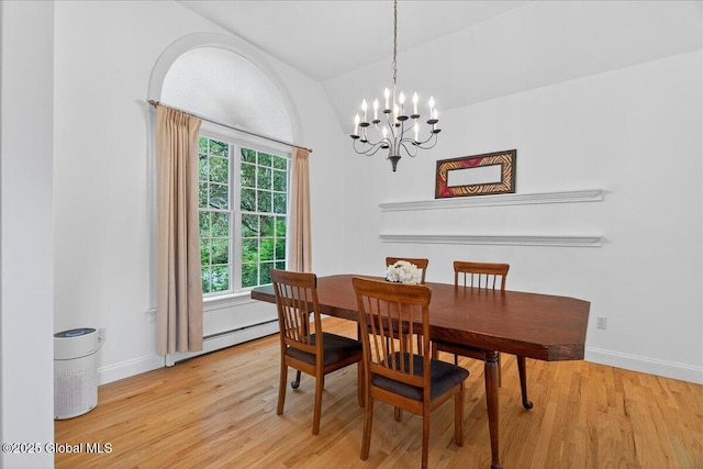 460 Grand Ave, Saratoga Springs, NY 12866 - dining room with vaulted ceiling, a chandelier, baseboard heating, and light wood-type flooring