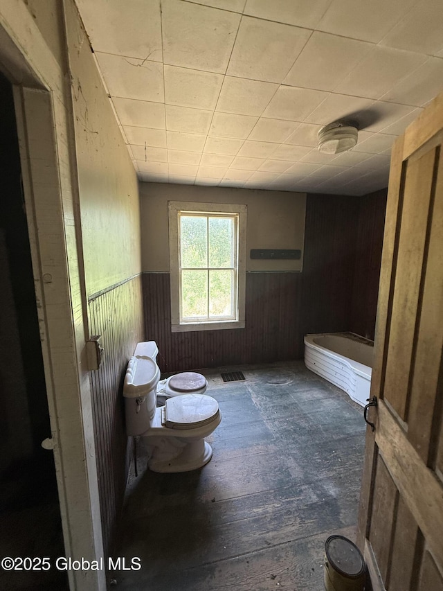 59 Lagrange Rd, Crown Point, NY 12928 - bathroom with wood walls, wainscoting, hardwood / wood-style flooring, and a bidet
