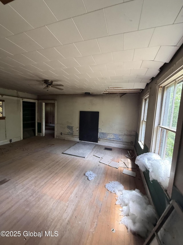59 Lagrange Rd, Crown Point, NY 12928 - unfurnished living room featuring hardwood / wood-style floors and ceiling fan