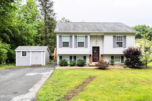 30 W State St, Glens Falls, NY 12801 - bi-level home with a shed, a front lawn, driveway, and roof with shingles