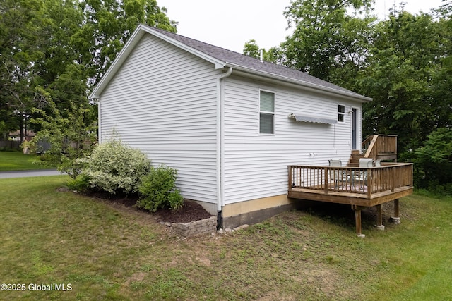30 W State St, Glens Falls, NY 12801 - view of home's exterior featuring a deck and a yard