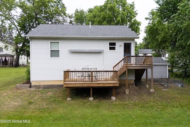 30 W State St, Glens Falls, NY 12801 - back of house featuring a wooden deck, a yard, and a shingled roof