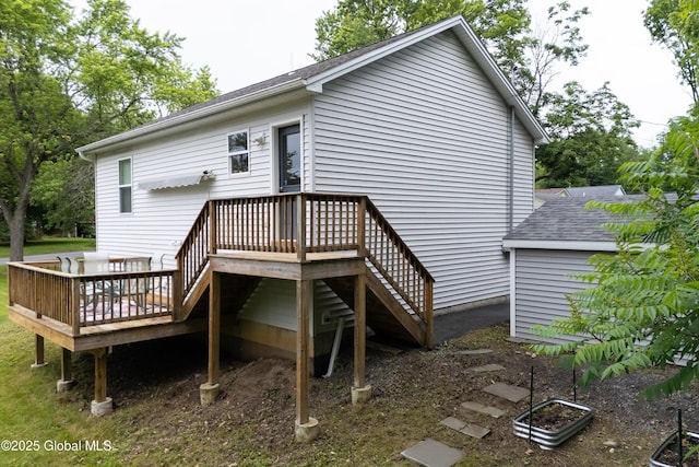 30 W State St, Glens Falls, NY 12801 - back of property featuring a deck and stairs