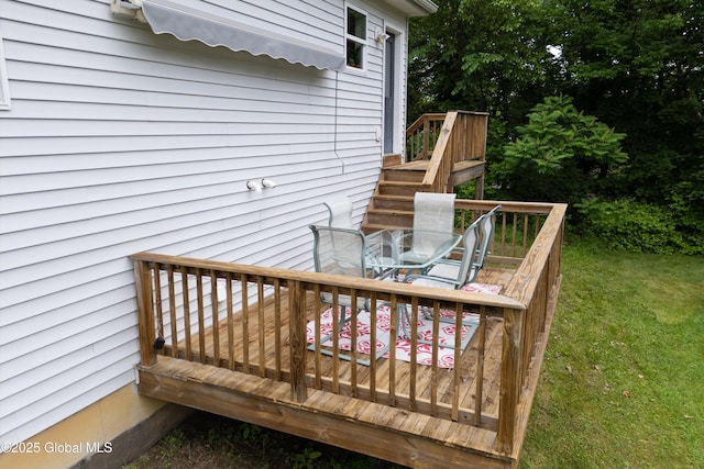 30 W State St, Glens Falls, NY 12801 - wooden deck with stairs and a yard