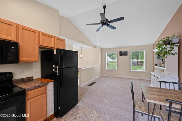 30 W State St, Glens Falls, NY 12801 - kitchen with black appliances, lofted ceiling, dark countertops, ceiling fan, and open floor plan