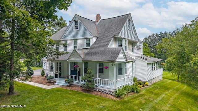 479 Loudon Rd, Colonie, NY 12211 - view of front facade featuring covered porch, a shingled roof, a front lawn, and a chimney