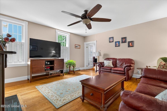 479 Loudon Rd, Colonie, NY 12211 - living area featuring a ceiling fan and wood finished floors