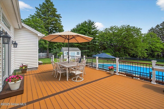 479 Loudon Rd, Colonie, NY 12211 - wooden deck featuring outdoor dining area and an outdoor structure