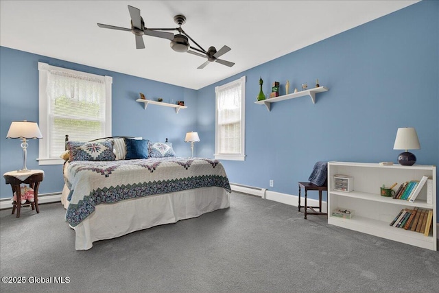 479 Loudon Rd, Colonie, NY 12211 - carpeted bedroom with a baseboard heating unit and a ceiling fan