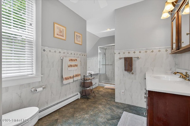 479 Loudon Rd, Colonie, NY 12211 - full bath with tile walls, baseboard heating, a stall shower, vanity, and a wainscoted wall