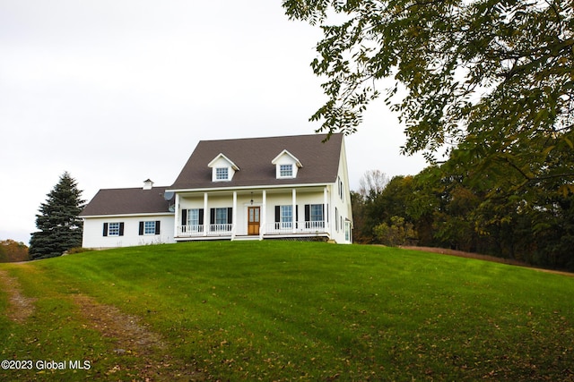 42 Stanton Rd, Jackson, NY 12873 - cape cod house featuring covered porch and a front yard
