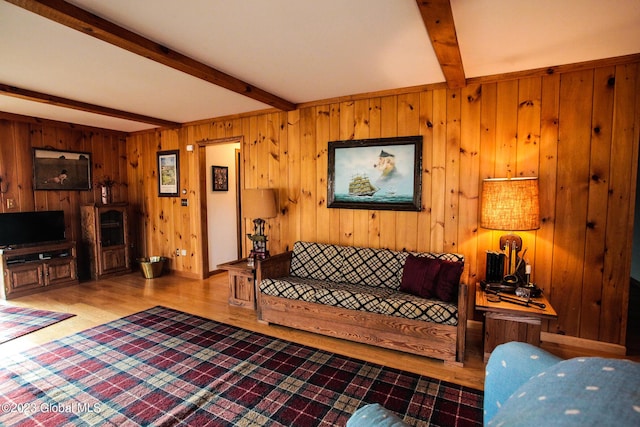 42 Stanton Rd, Jackson, NY 12873 - living room featuring beam ceiling, wood finished floors, and wood walls