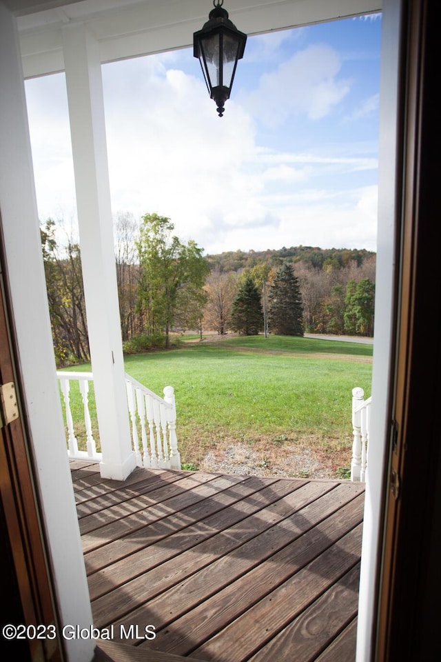 42 Stanton Rd, Jackson, NY 12873 - wooden porch featuring a yard