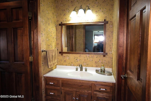 42 Stanton Rd, Jackson, NY 12873 - bathroom featuring wallpapered walls and vanity