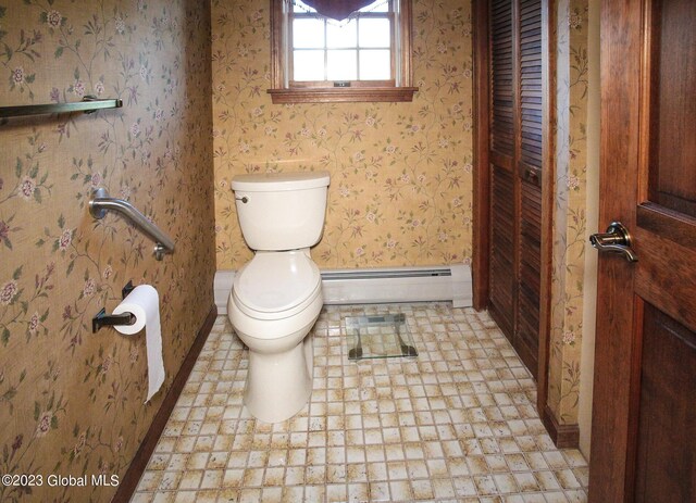 42 Stanton Rd, Jackson, NY 12873 - half bath with a baseboard heating unit and toilet
