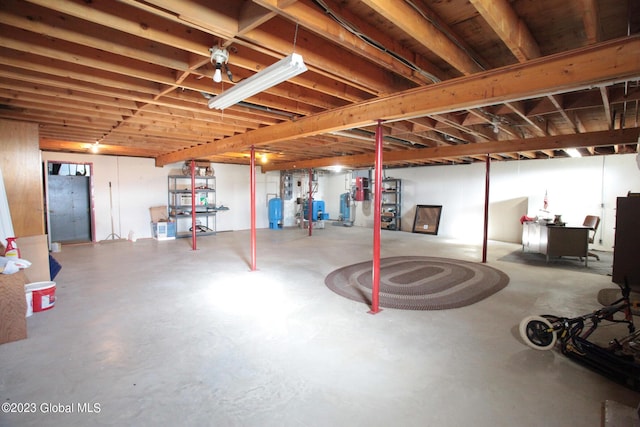 42 Stanton Rd, Jackson, NY 12873 - below grade area featuring a heating unit and a water pressure tank