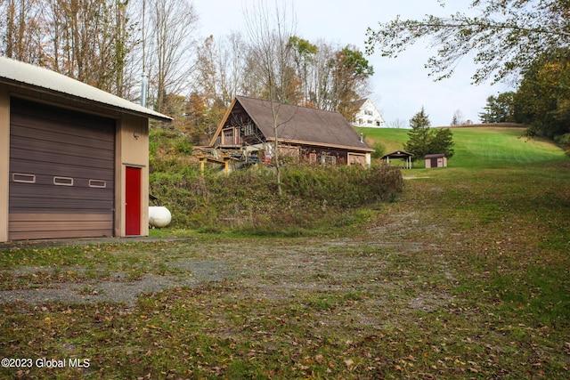 42 Stanton Rd, Jackson, NY 12873 - view of yard featuring a garage
