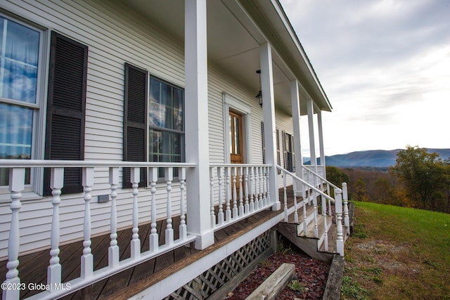 42 Stanton Rd, Jackson, NY 12873 - view of home's exterior featuring covered porch and a mountain view