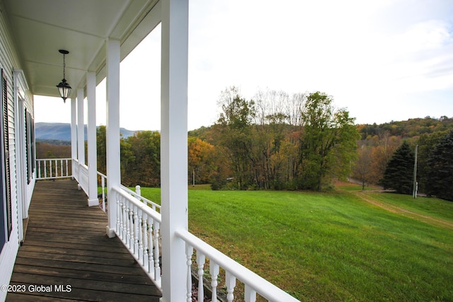 42 Stanton Rd, Jackson, NY 12873 - wooden porch with a yard
