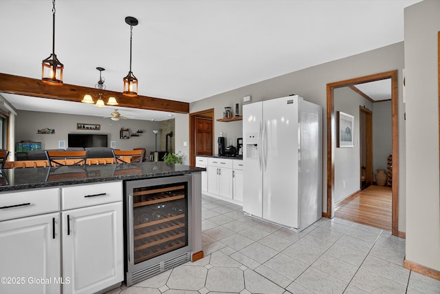 1560 Division St, Charlton, NY 12010 - bar with white refrigerator with ice dispenser, wine cooler, light tile patterned flooring, and decorative light fixtures