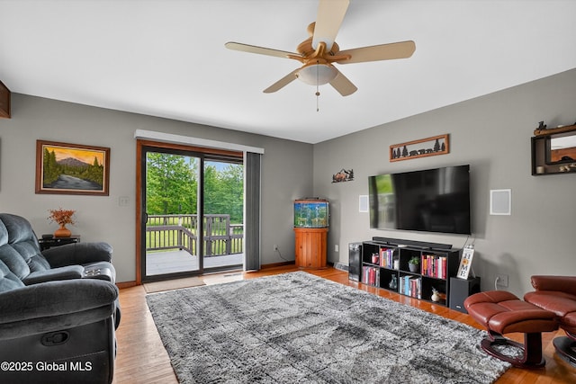 1560 Division St, Charlton, NY 12010 - living area featuring ceiling fan and wood finished floors