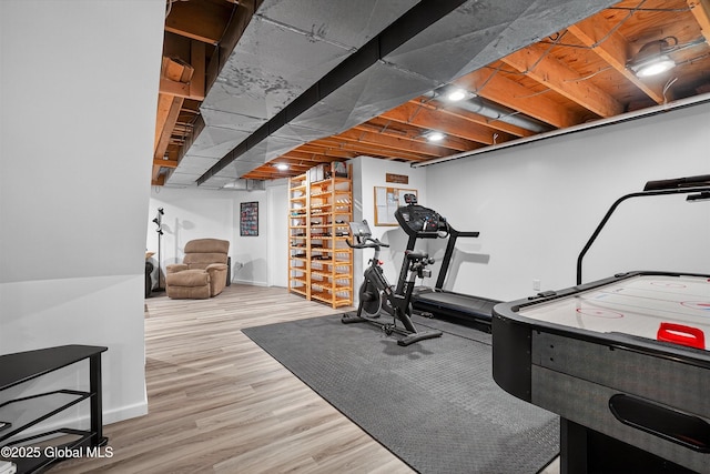 1560 Division St, Charlton, NY 12010 - exercise area with wood finished floors and baseboards