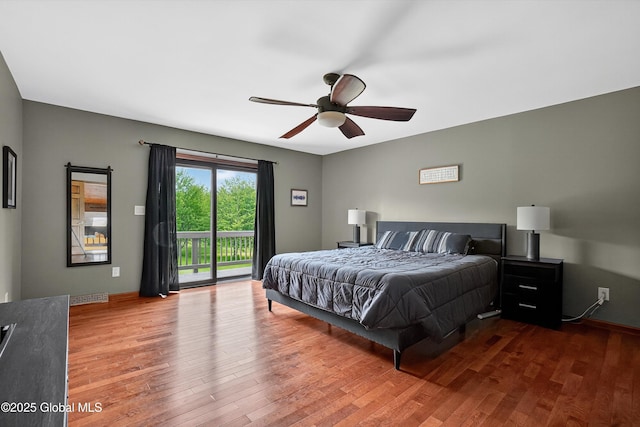 1560 Division St, Charlton, NY 12010 - bedroom with access to exterior, wood finished floors, and a ceiling fan