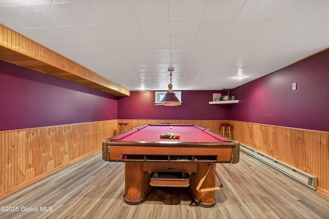 1560 Division St, Charlton, NY 12010 - game room with a baseboard radiator, a wainscoted wall, wood finished floors, billiards table, and wooden walls