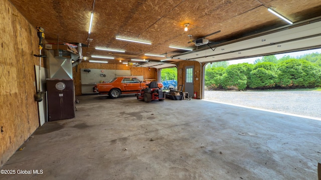 1560 Division St, Charlton, NY 12010 - garage featuring a garage door opener
