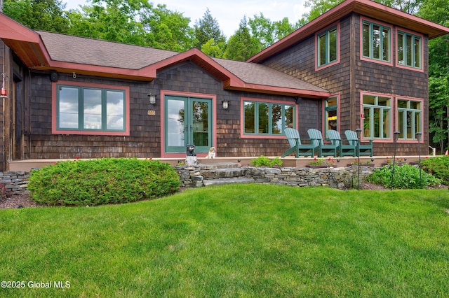 555 Trout Lake Rd, Bolton, NY 12824 - chalet / cabin featuring a front lawn and a shingled roof
