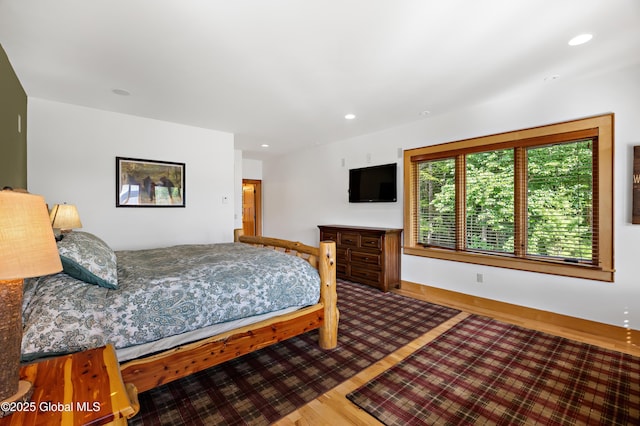 555 Trout Lake Rd, Bolton, NY 12824 - bedroom featuring wood finished floors and recessed lighting