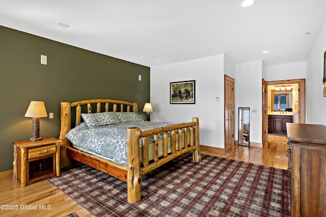 555 Trout Lake Rd, Bolton, NY 12824 - bedroom featuring light wood-style floors and recessed lighting