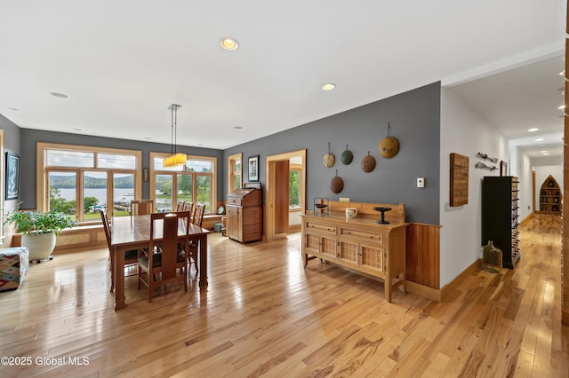 555 Trout Lake Rd, Bolton, NY 12824 - dining room featuring light wood-style flooring, recessed lighting, and a water view